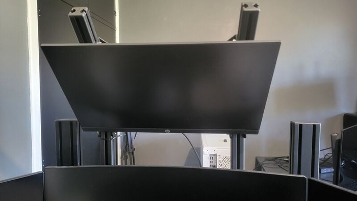4th monitor stand for triple screen setup sim rig