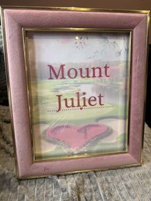 7 pink picture frames
