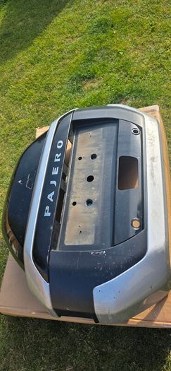 Mitsubishi Pajero rear door, spare wheel carrier cover / trim