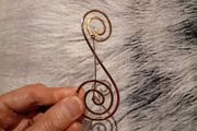 Gold toned Swirl design broach
