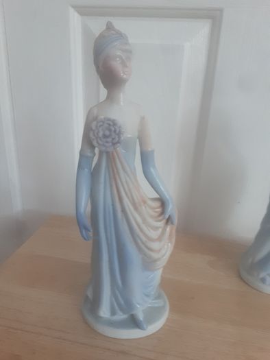 Ornament/Two Glazed Lady Figurines ..  for12.00euro