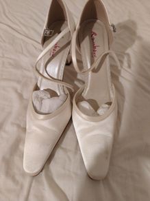ivory rainbow club wedding heels. Size 6 and 1/2.