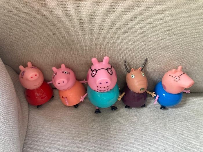 Peppa pig characters and suitcase