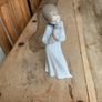 Beautiful Figure Holding Puppy Image 3