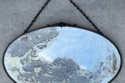 Art Deco oval copper distressed mirror c1930