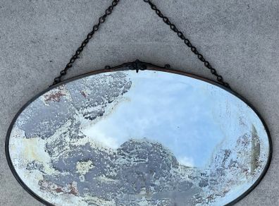 Art Deco oval copper distressed mirror c1930