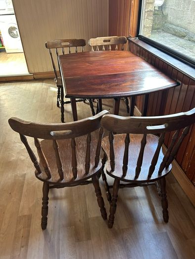 Wooden dining table and six chairs