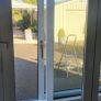 Large white bifold pvc door ,grey wrap on outside Image 5