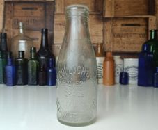 500 - J McCulloch and Sons Gerrardstown Vintage Clear Glass Cork Top Collectible Decorative Milk Bottle