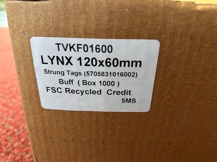 Box of strung tags/labels