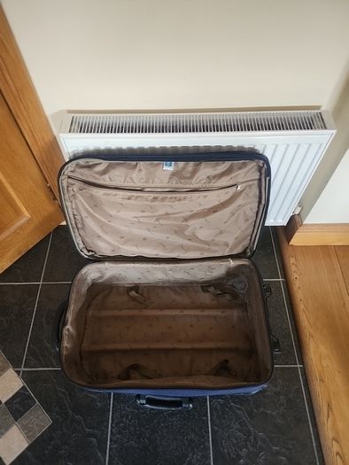 Large navy suitcase
