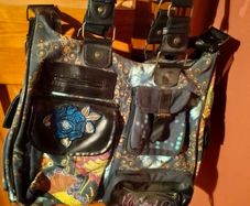 This is a multicoloured Desigual patchwork shoulder bag.