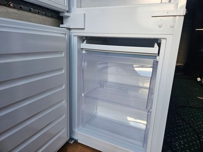 whirlpool integrated fridge freezer
