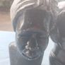 2x Tribal carved stone heads Image 3
