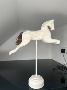 2 Carved wooden horses
