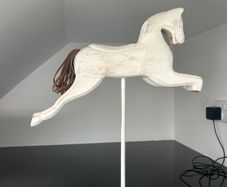 2 Carved wooden horses
