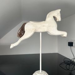 2 Carved wooden horses