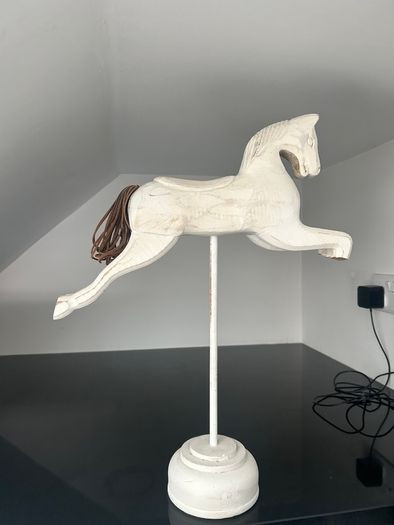 2 Carved wooden horses