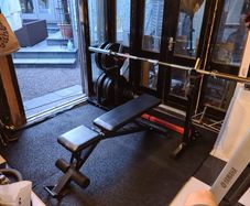 Gym squat rack, bench, and plate holder