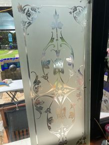 Acid etched glass panel