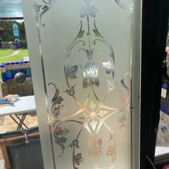 Acid etched glass panel