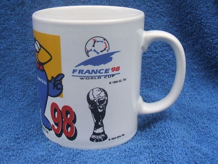 FRANCE 98 (16th FIFA World Cup) - an official merchandise/souvenir mug for the 1998 soccer World Cup