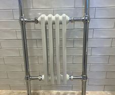 Stunning chrome and enamel towel radiator