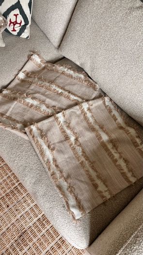 Two cushion covers