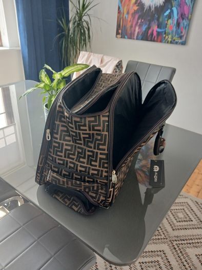 Brown carrier bag on wheels