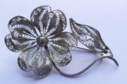 Vintage silver filigree flower brooch