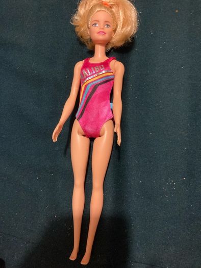 Two Barbie Dolls.