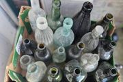 Box of Vintage Bottles and Schweppes Soda Syphon