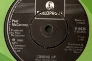 Paul McCartney - Coming Up. Irish seven inch single from 1980 with green EMI Irish cover. Die Cut Centre version. Mint.
