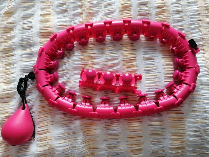 Adjustable weighted hula hoop