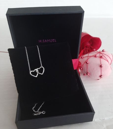 New silver pendant with real diamonds