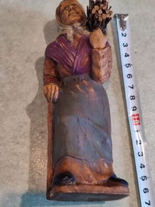 Vintage P. Maeder Lucerne Switzerland Wood Carving Of Woman  Holding Bundle Of Wood.