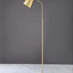 Considered by Helen James gold lamp