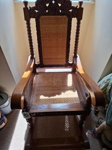 Hand Carved highly ornate Hardwood Rocking chair