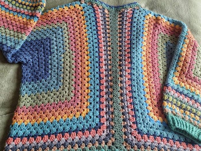 Crocheted colourful hexagon jacket