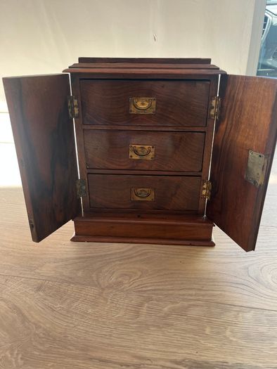 Antique collectors cabinet