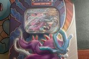 Pokemon. Paradox Clash Tin featuring the Ancient Pokemon Walking Wake ex.