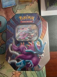 Pokemon. Paradox Clash Tin featuring the Ancient Pokemon Walking Wake ex.