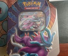 Pokemon. Paradox Clash Tin featuring the Ancient Pokemon Walking Wake ex.
