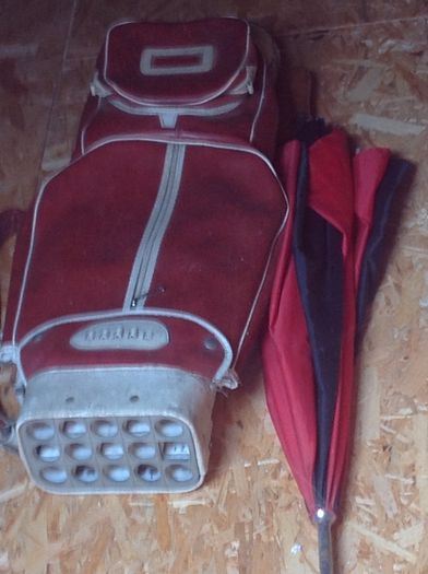 Golf bags and some golf clubs