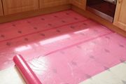 Self-adhesive film, quickly and simply applied to most hard surfaces such as worktops and kitchen units and protects against scratches, dirt, dust, spills and splashes.