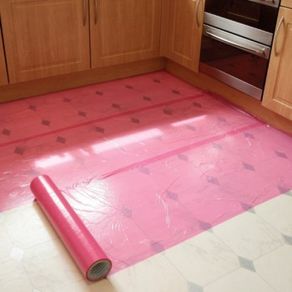 Self-adhesive film, quickly and simply applied to most hard surfaces such as worktops and kitchen units and protects against scratches, dirt, dust, spills and splashes.