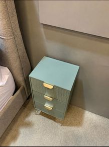 Pair of Harvey Norman Frankie bedside lockers in green with gold handles and legs.
