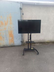 Large Philips TV on Mobile Stand  Ideal for Office Presentation