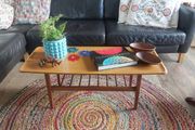 Unusual and Practical Mid-Century Modern Wooden Coffee Table with a Hard-Wearing Wood-Patterned Melamine Top and Slatted Magazine Shelf