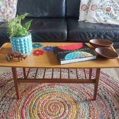 Unusual and Practical Mid-Century Modern Wooden Coffee Table with a Hard-Wearing Wood-Patterned Melamine Top and Slatted Magazine Shelf